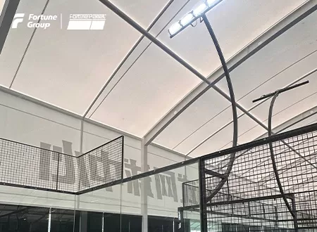 How does a club choose between an electric or fixed roof model?